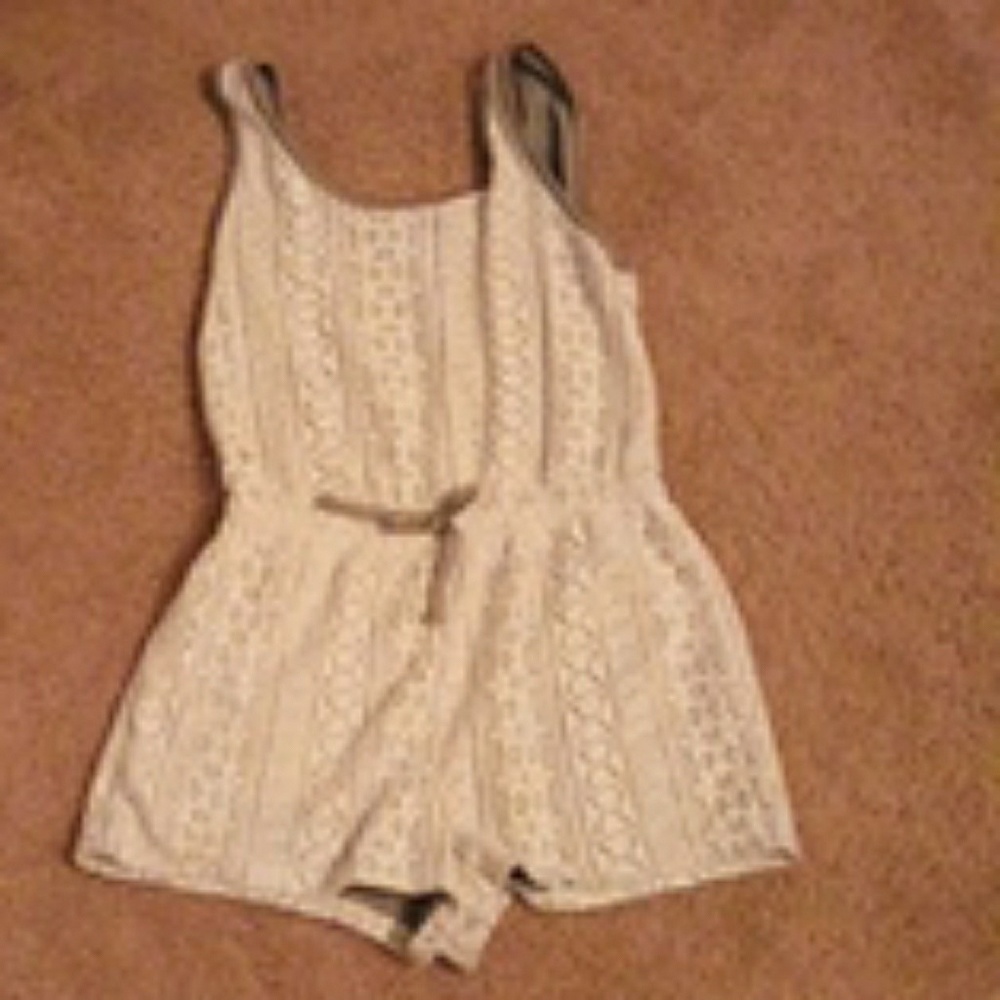 A white jumpsuit .